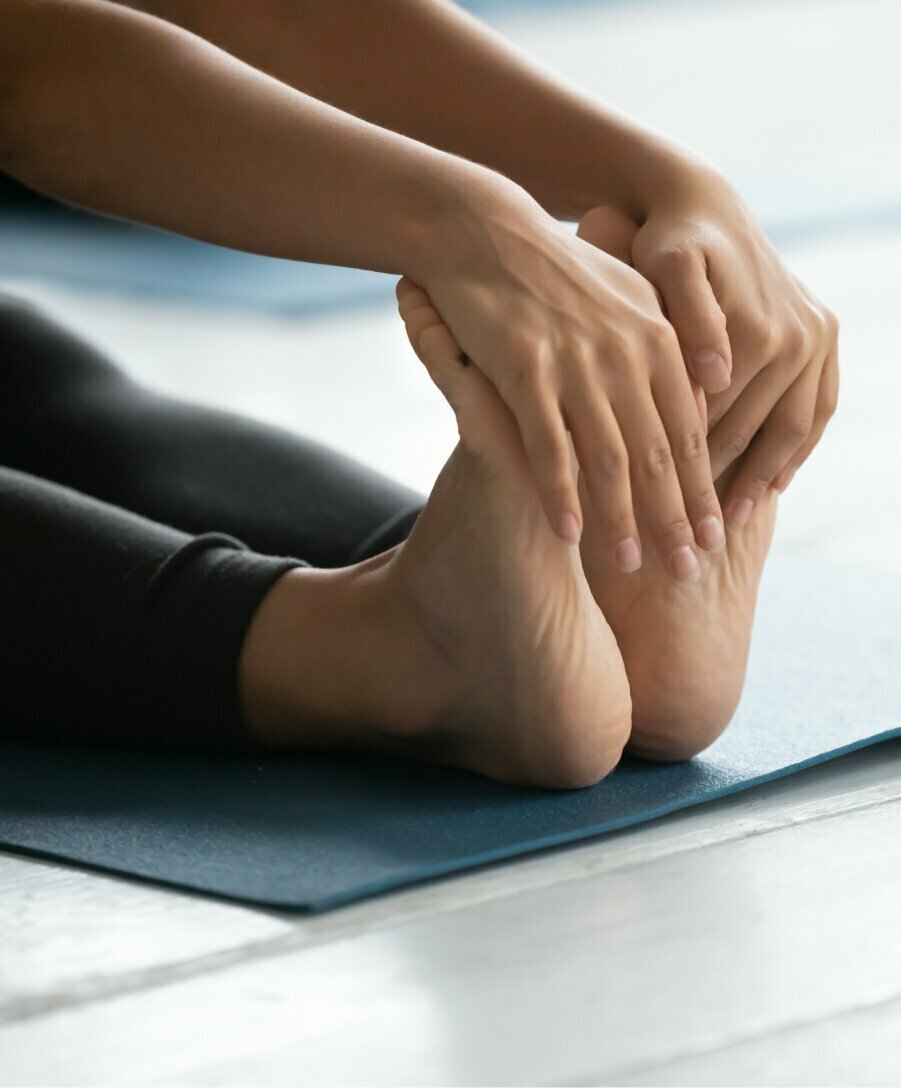 stretching and grabbing toes