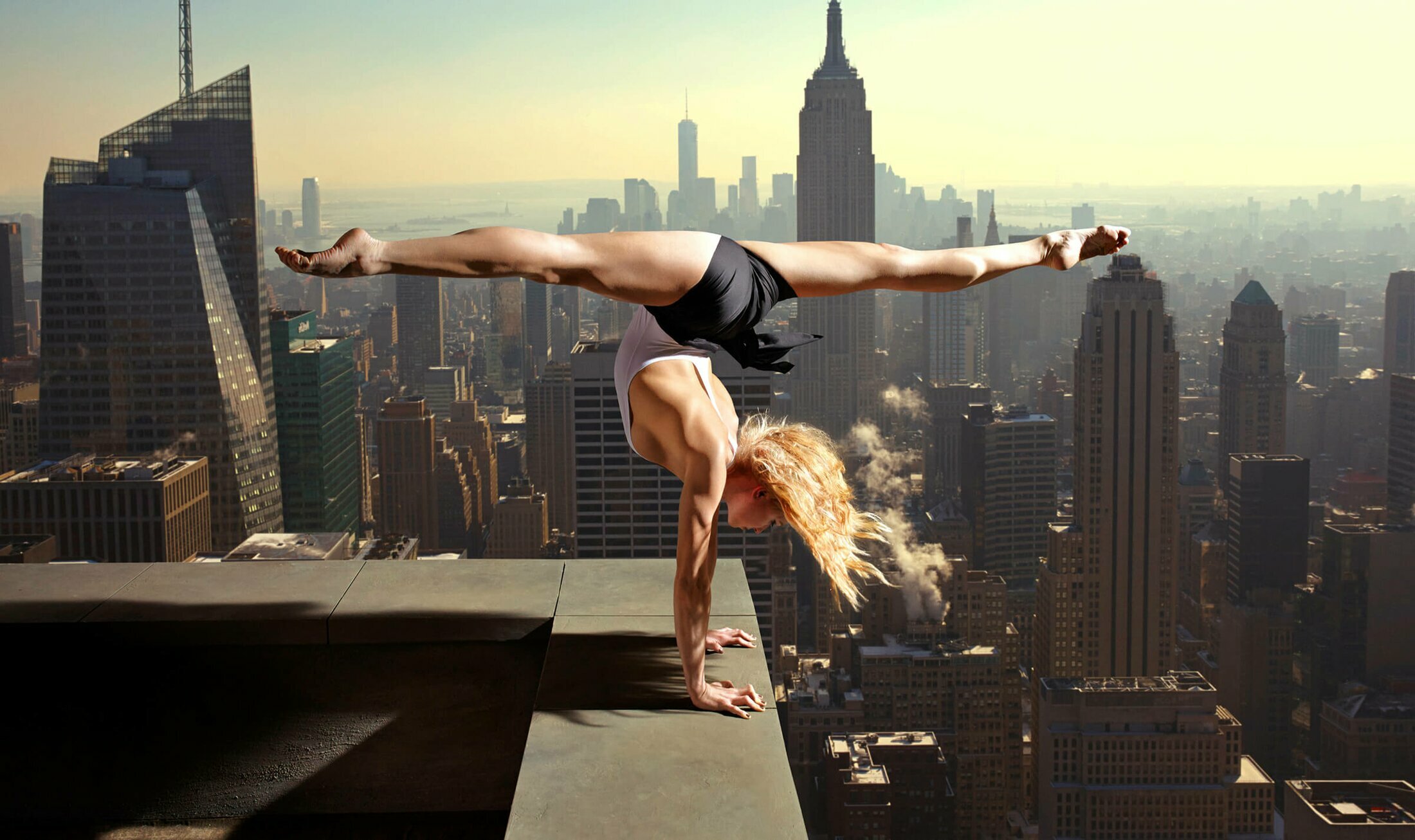 Woman in gymnast pose in NYC