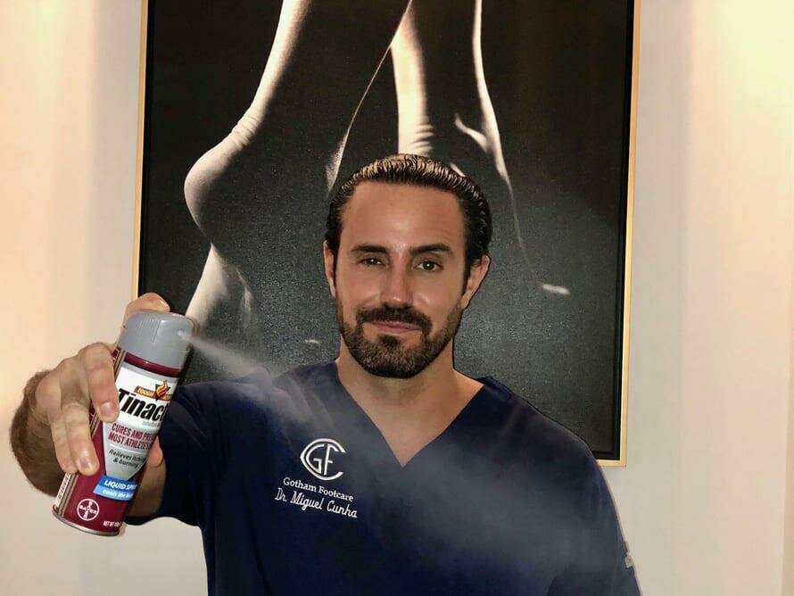 Dr Cunha with spray